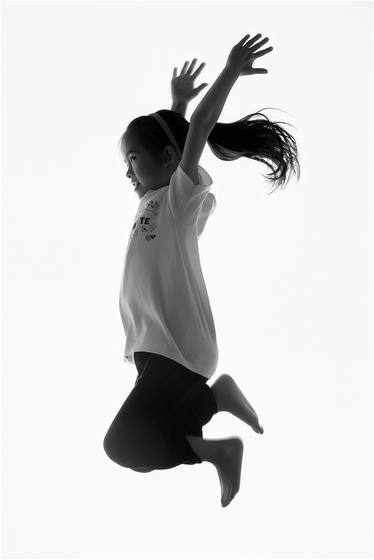 Camper photographed in motion against a studio backdrop