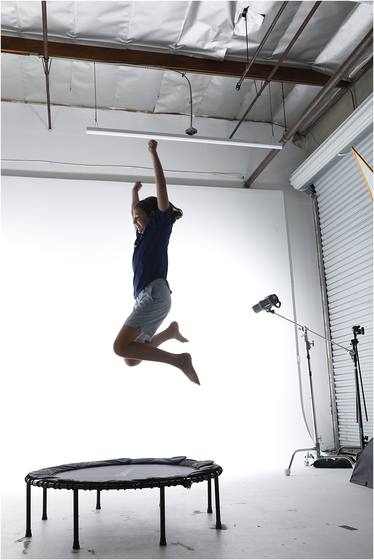Camper photographed in motion against a studio backdrop