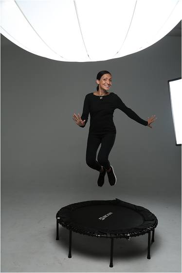 Camper photographed in motion against a studio backdrop